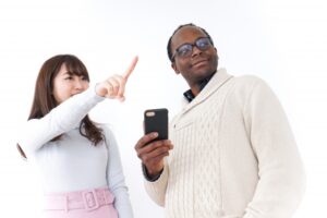Two people communicating with a smile