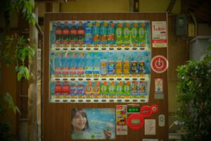 A person using a Japanese vending machine